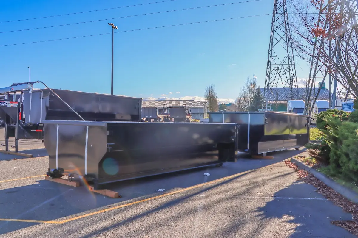 Roll-off dumpster ready for waste disposal at job site for Cleanout Dumpster Rental in Hampstead